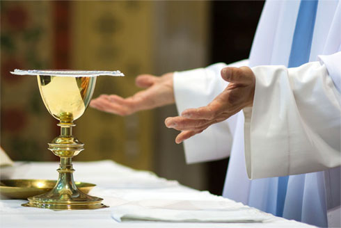 Priest during a wedding ceremony/nuptial mass